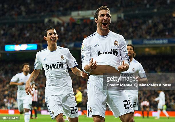 Gonzalo Higuain of Real Madrid celebrates after scoring the 1-0 during the la liga match between Real Madrid and Athletic Bilbao at Estadio Santiago...