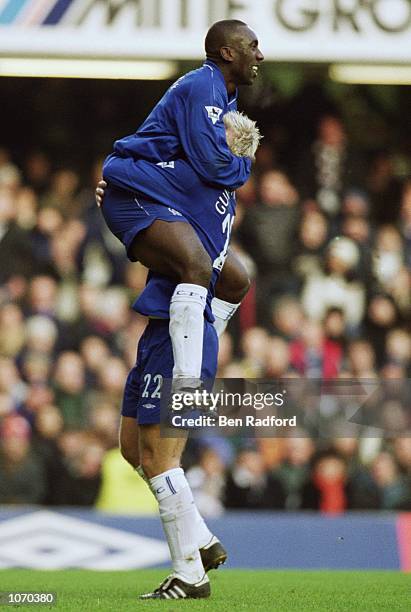 Jimmy Floyd Hasselbaink and Eidur Gudjohnsen of Chelsea celebrate during the FA Barclaycard Premiership match against Bolton Wanderers at Stamford...