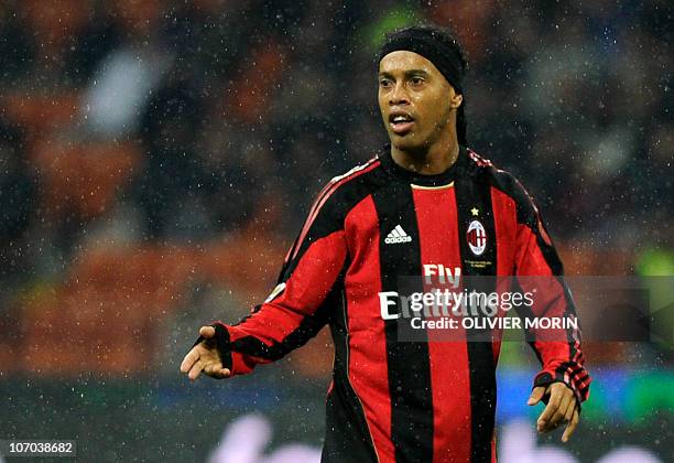 Milan's Brazilian forward Ronaldinho gestures during the Italian serie A football match against Fiorentina at San Siro stadium in Milan on November...