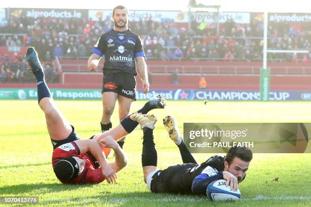 Castres' French wing Martin Laveau dives over the line to score their late try during the European Champions Cup Pool 2 rugby union match between...
