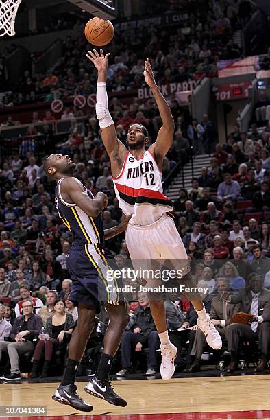 LaMarcus Aldridge of the Portland Trail Blazers shoots over Francisco Elson of the Utah Jazz on November 20, 2010 at the Rose Garden in Portland,...