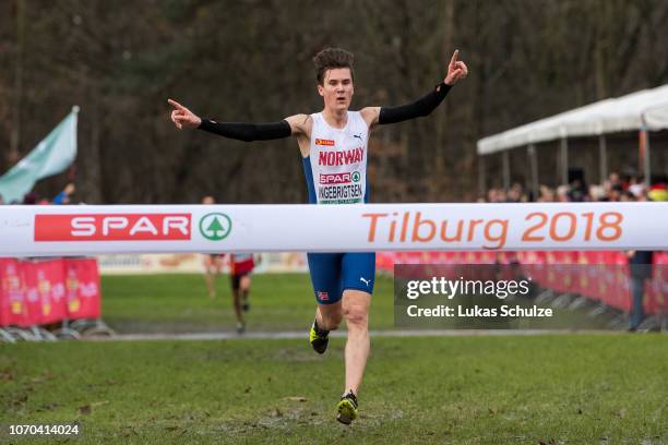 Winner Jakob Ingebrigtsen of Norway celebrates during the U20 Men's race of the SPAR European Cross Country Championships on December 9, 2018 in...