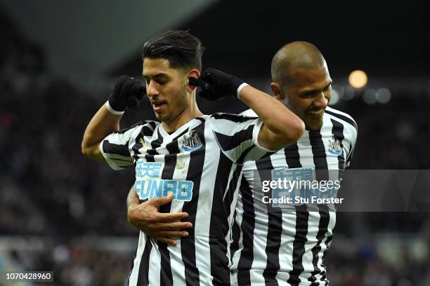 Ayoze Perez of Newcastle United celebrates after scoring his team's first goal with Salomon Rondon during the Premier League match between Newcastle...