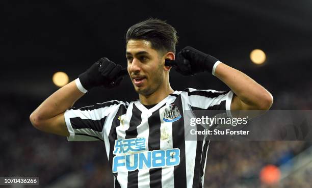 Newcastle player Ayoze Perez celebrates by putting his fingers in his ears after scoring the first Newcastle goal during the Premier League match...