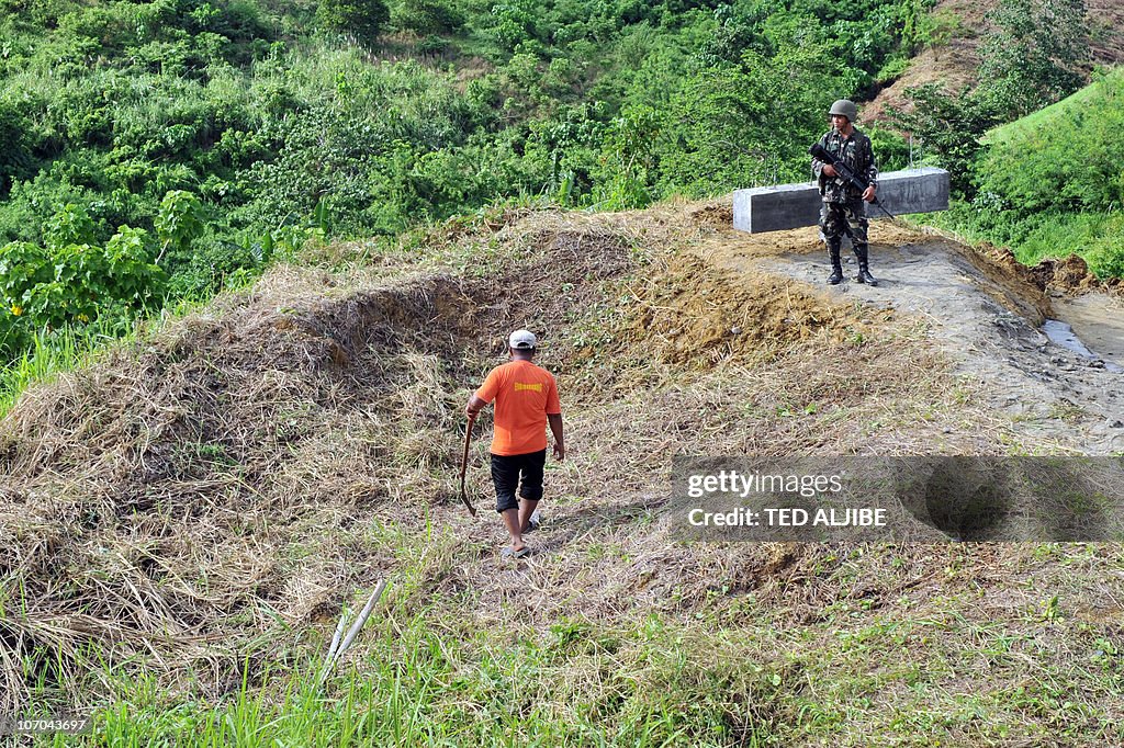 A Philippine soldiers stands guard next