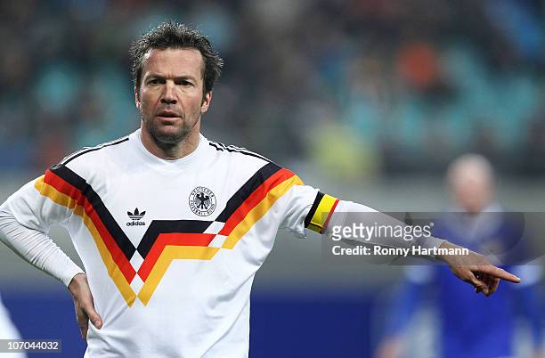 Lothar Matthaeus of the World Champion 1990 gestures during the Reunification match between the World Champion 1990 and the DFV Legend at the Red...