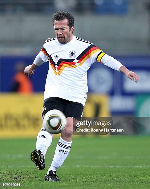 Lothar Matthaeus of the World Champion 1990 kicks the ball during the Reunification match between the World Champion 1990 and the DFV Legend at the...