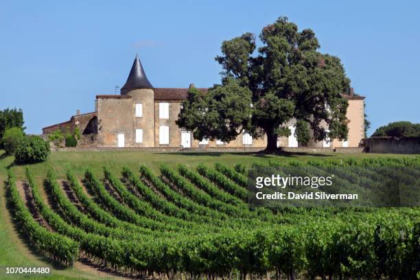 View of the vineyards and manor house at the 18th century Château Puynard winery on June 28, 2018 in the village of Berson, France. Andrew Eakin and...