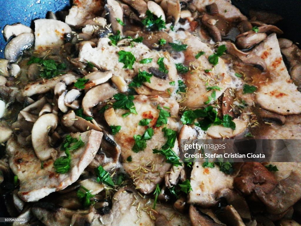 Beef stroganoff with mushrooms in pan