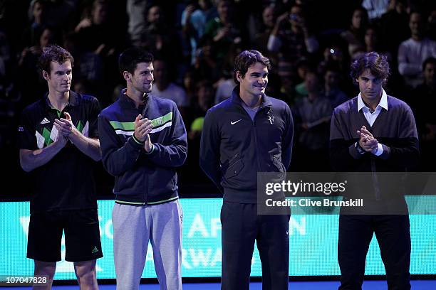 Andy Murray of Great Britain, Novak Djokovic of Siberia, Roger Federer of Switzerland and Rafael Nadal of Spain attend a ceremony for Carlos Moya's...