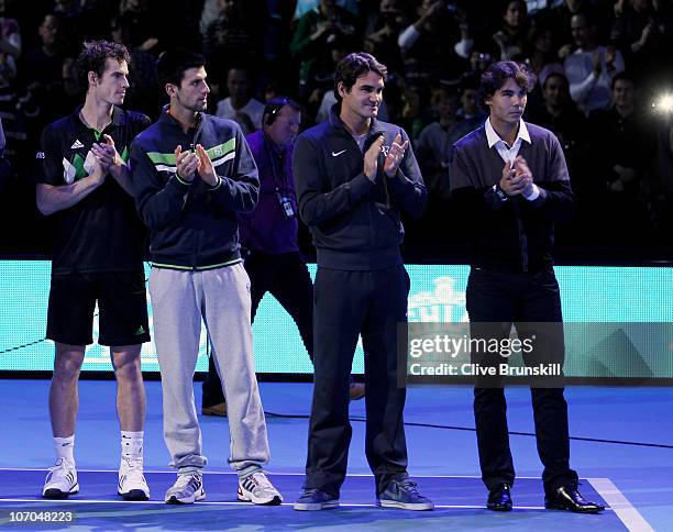 Andy Murray of Great Britain, Novak Djokovic of Siberia, Roger Federer of Switzerland and Rafael Nadal of Spain attend a ceremony for Carlos Moya's...