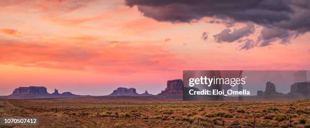 red sunset in monument valley. arizona. usa - arizona sunset stock pictures, royalty-free photos & images