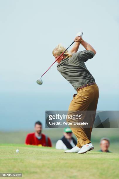 John Daly tee shot during the 1995 Open Championship on 20–23 July 1995 at the Old Course at St Andrews in St Andrews, Scotland. John Daly won his...