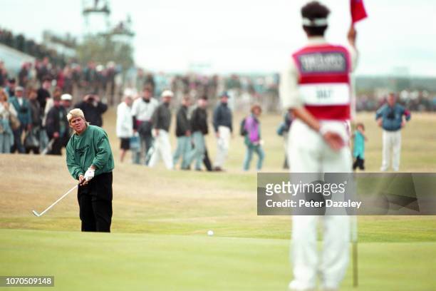 John Daly chipping to green during the 1995 Open Championship on 20–23 July,1995 at the Old Course at St Andrews in St Andrews, Scotland. John Daly...