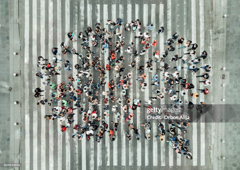 High Angle View Of People forming a speech bubble