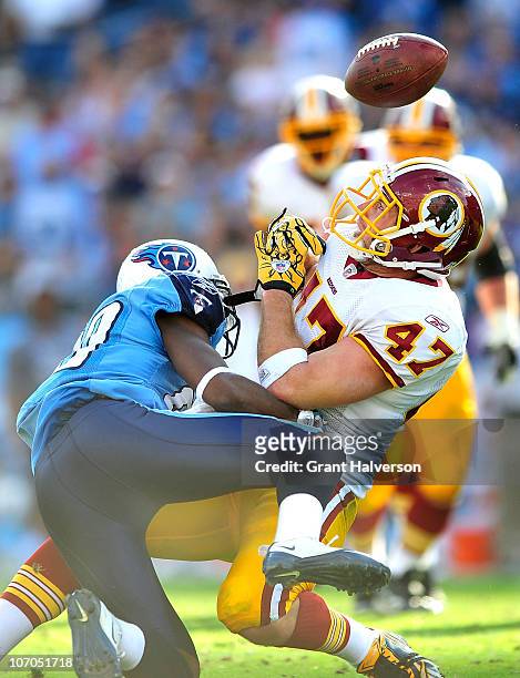 Alterraun Verner of the Tennessee Titans braks up a pass intended for Chris Cooley of the Washington Redskins at LP Field on November 21, 2010 in...