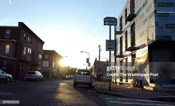 Child walks down Susquehanna Ave. At the intersection of Bouvier Street on March 31, 2010 in North Philadelphia. Philadelphia policeman Patrick...