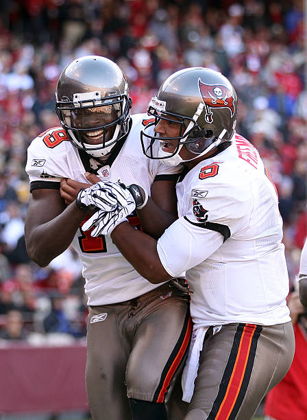 Mike Williams of the Tampa Bay Buccaneers is congratulated by Josh Freeman after he scored a touchdown against the San Francisco 49ers at Candlestick...