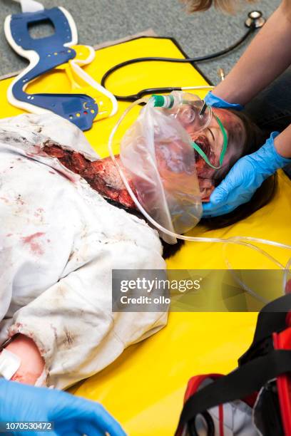 first aid paramedic training - emergency treatment - burns victims stock pictures, royalty-free photos & images