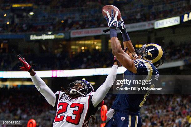 Brandon Gibson of the St. Louis Rams catches a touchdown pass against Dunta Robinson of the Atlanta Falcons at the Edward Jones Dome on November 21,...