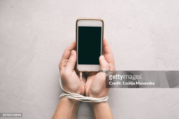 mobile phone addiction - verslaving stockfoto's en -beelden