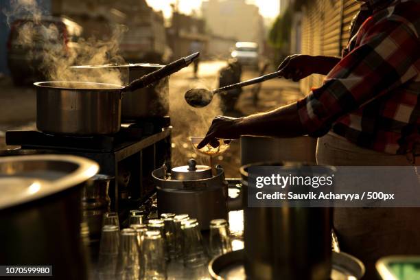 street tea seller - sauvik acharyya stock-fotos und bilder