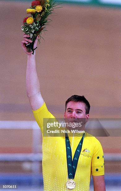 Matthew Gray of Australia celebrates winning the Gold Medal in the LC1-1000m Time Trial during the 2000 Paralympic Games at the Dunc Gray Veledrome...