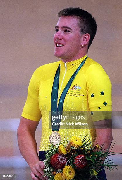 Matthew Gray of Australia celebrates winning the Gold Medal in the LC1-1000m Time Trial during the 2000 Paralympic Games at the Dunc Gray Veledrome...