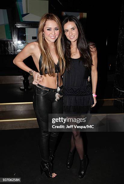 Singer Miley Cyrus and actress Demi Moore attend Miley Cyrus' 18th Birthday Party at Trousdale on November 21, 2010 in West Hollywood, California.