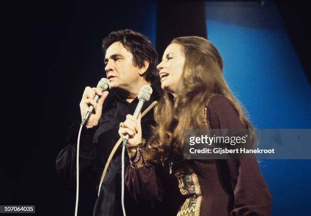 Johnny Cash and June Carter perform on stage at Concertgebouw in 1972 in Amsterdam, Netherlands.
