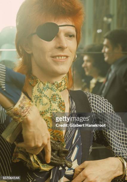 Portrait of David Bowie being interviewed wearing an eye patch at the Amstel Hotel on 7th February 1974 in Amsterdam, Netherlands.