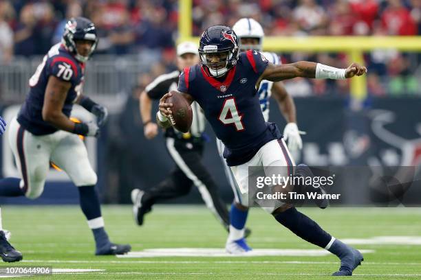 Deshaun Watson of the Houston Texans scrambles in the first quarter against the Indianapolis Colts at NRG Stadium on December 9, 2018 in Houston,...
