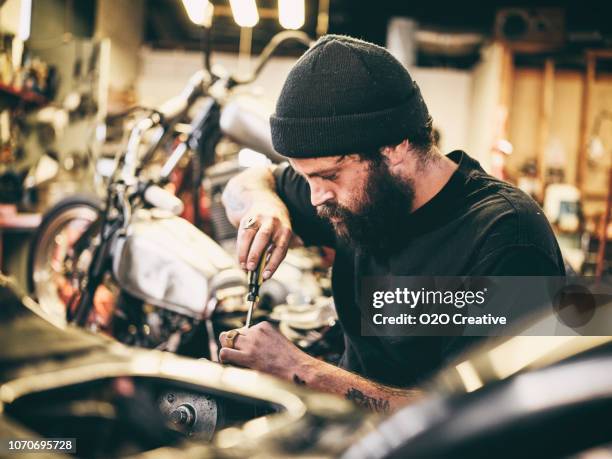 retro motorcycle mechanic - customised stock pictures, royalty-free photos & images