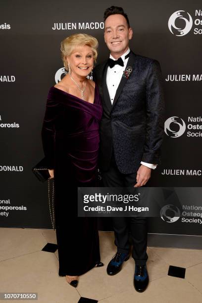 Angela Rippon and Craig Revel Horwood attend the Julien Macdonald Fashion Show for National Osteoporosis Society at Lancaster House on November 21,...