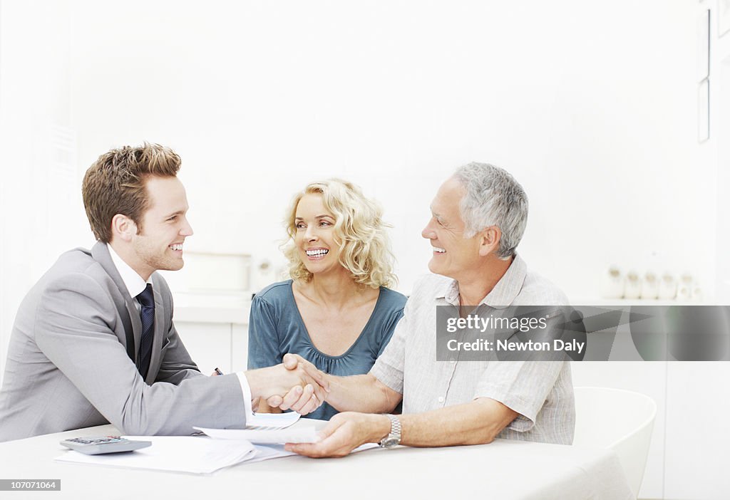 Couple in meeting with financial adviser
