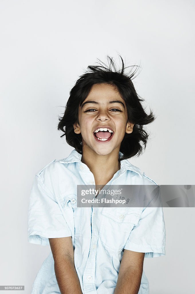Portrait of boy laughing
