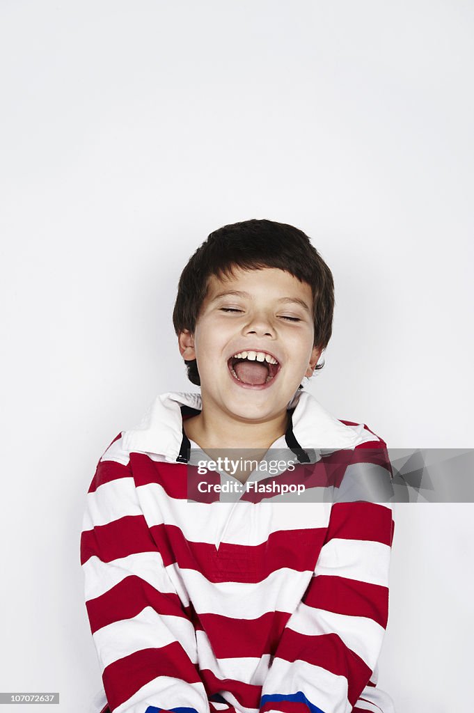 Portrait of boy laughing