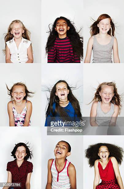 group of children laughing - only girls stock pictures, royalty-free photos & images