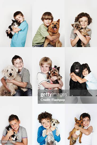 group of children hugging their pets - hug animal group stock pictures, royalty-free photos & images