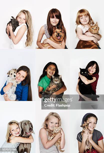 group of children hugging their pets - multiple pets stock pictures, royalty-free photos & images