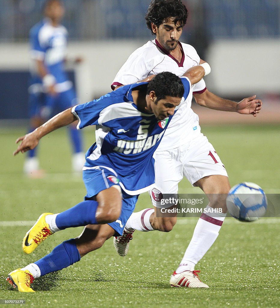 Kuwait's Mohammed Rashid (5) vies for th