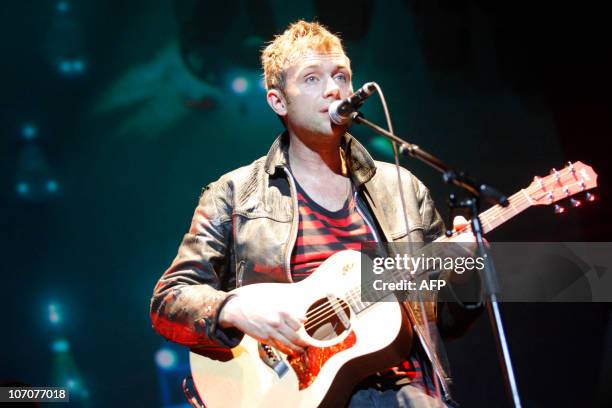 British singer-songwriter of the band Gorillaz Damon Albarn performs on stage on November 22, 2010 at the Zenith music hall in Paris. AFP PHOTO...