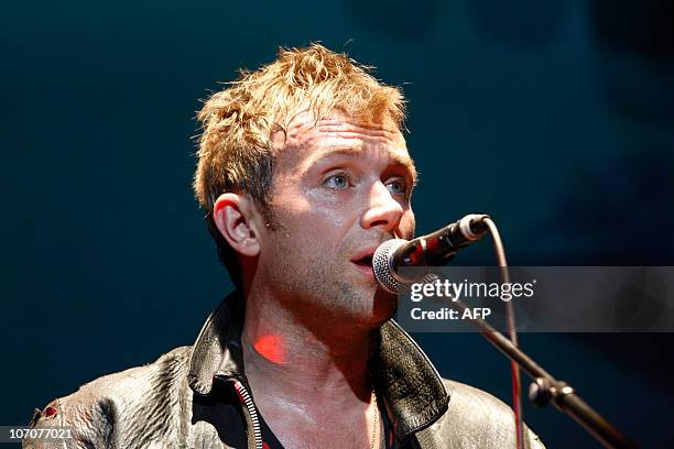 British singer-songwriter of the band Gorillaz Damon Albarn performs on stage on November 22, 2010 at the Zenith music hall in Paris. AFP PHOTO...
