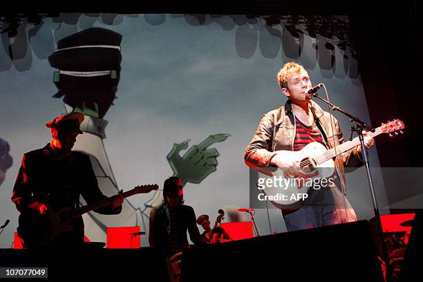British singer-songwriter Damon Albarn performs on stage with his band "Gorillaz" on November 22, 2010 at the Zenith music hall in Paris. AFP PHOTO...
