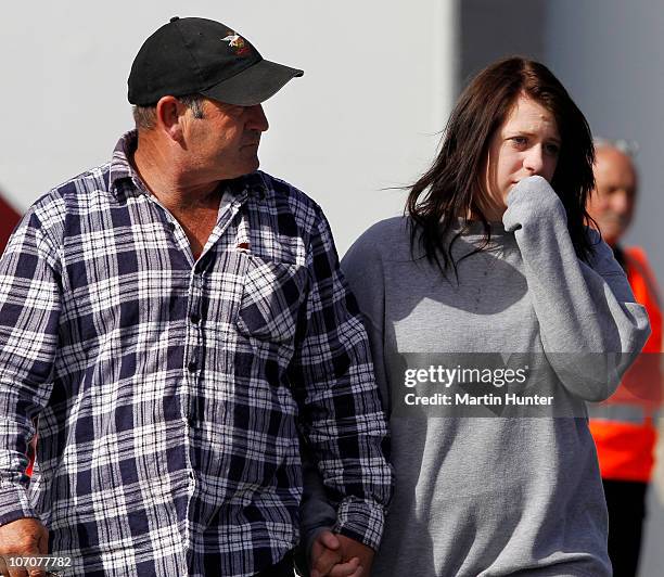 Friends and family of the missing miners support each other after the morning's briefings on November 23, 2010 in Greymouth, New Zealand. Police...