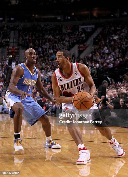 Andre Miller of the Portland Trail Blazers drives against Chauncey Billups of the Denver Nuggets on November 18, 2010 at the Rose Garden in Portland,...