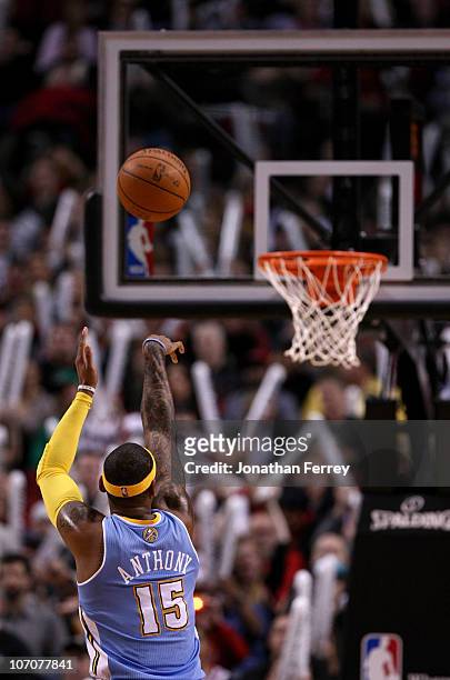 Carmelo Anthony of the Denver Nuggets shoots a free throw against the Portland Trail Blazers on November 18, 2010 at the Rose Garden in Portland,...