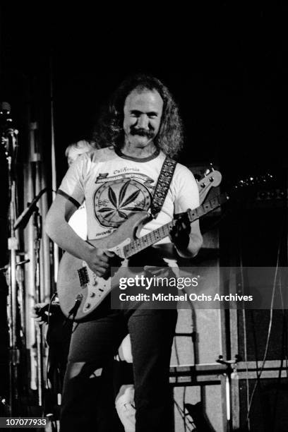 David Crosby performs with Neil Young and his band The Stray Gators Tim Drummond and Johnny Barbata at the Forum on April 1, 1973 in Inglewood,...