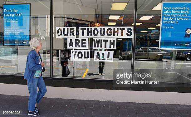 Sign which reads "Our thoughts are with you all" is displayed in a Greymouth Streets in support of the 29 miners and contractors trapped in the Pike...