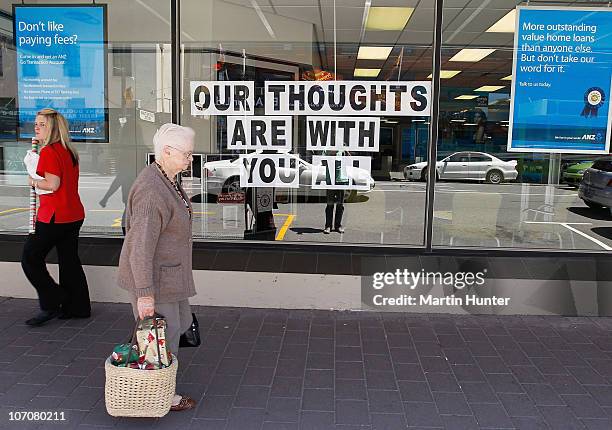 Sign which reads "Our thoughts are with you all" is displayed in a Greymouth Streets in support of the 29 miners and contractors trapped in the Pike...